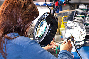 Soldering work on the production floor