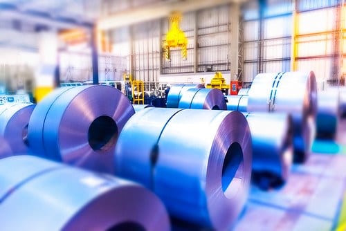 Rolled steel coils in an industrial manufacturing facility
